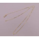 A small 9 ct gold chain. 40 cm long. 0.8 grammes.