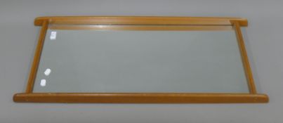 A 20th century retro wall mirror.