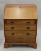 A mahogany bureau. 76 cm wide.