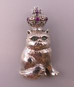 A sterling silver pendant formed as a cat. 3.5 cm high.