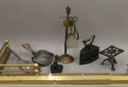 A brass fender and various accoutrements.