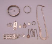 A quantity of silver jewellery including three St Christopher pendants. 120 grammes.