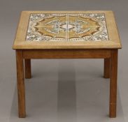 A Danish tile top coffee table. 51.5 cm squared.