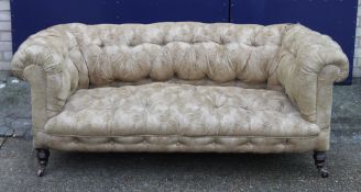 A Victorian Chesterfield settee. Approximately 170 cm long.