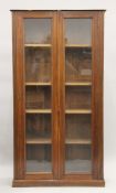 A Victorian glazed bookcase. 85 cm wide x 157 cm high.