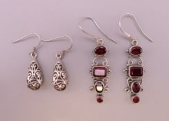 Two pairs of silver earrings. 3.5 cm long and 2 cm long excluding suspension hook.