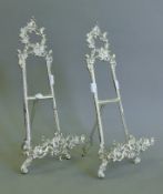 A pair of silver plated table easels. 41 cm high.