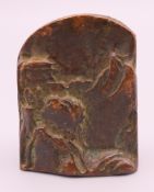 A small bronze mountain form seal. 4.5 cm high.