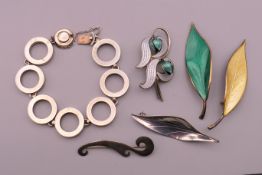 A quantity of silver and enamel jewellery.