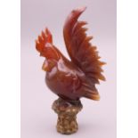 A Chinese agate cockerel form top finial. 9.5 cm high.
