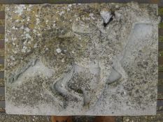 A composite plaque decorated with a horse and jockey. 43 cm wide x 30 cm high.