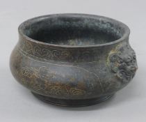A Chinese unmarked white metal inlaid bronze censer. 17 cm wide.