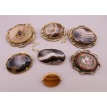 A quantity of various Victorian brooches, including banded agate.