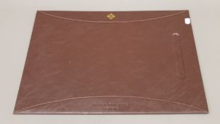 A Patek Philippe desk blotter. 54 cm wide.