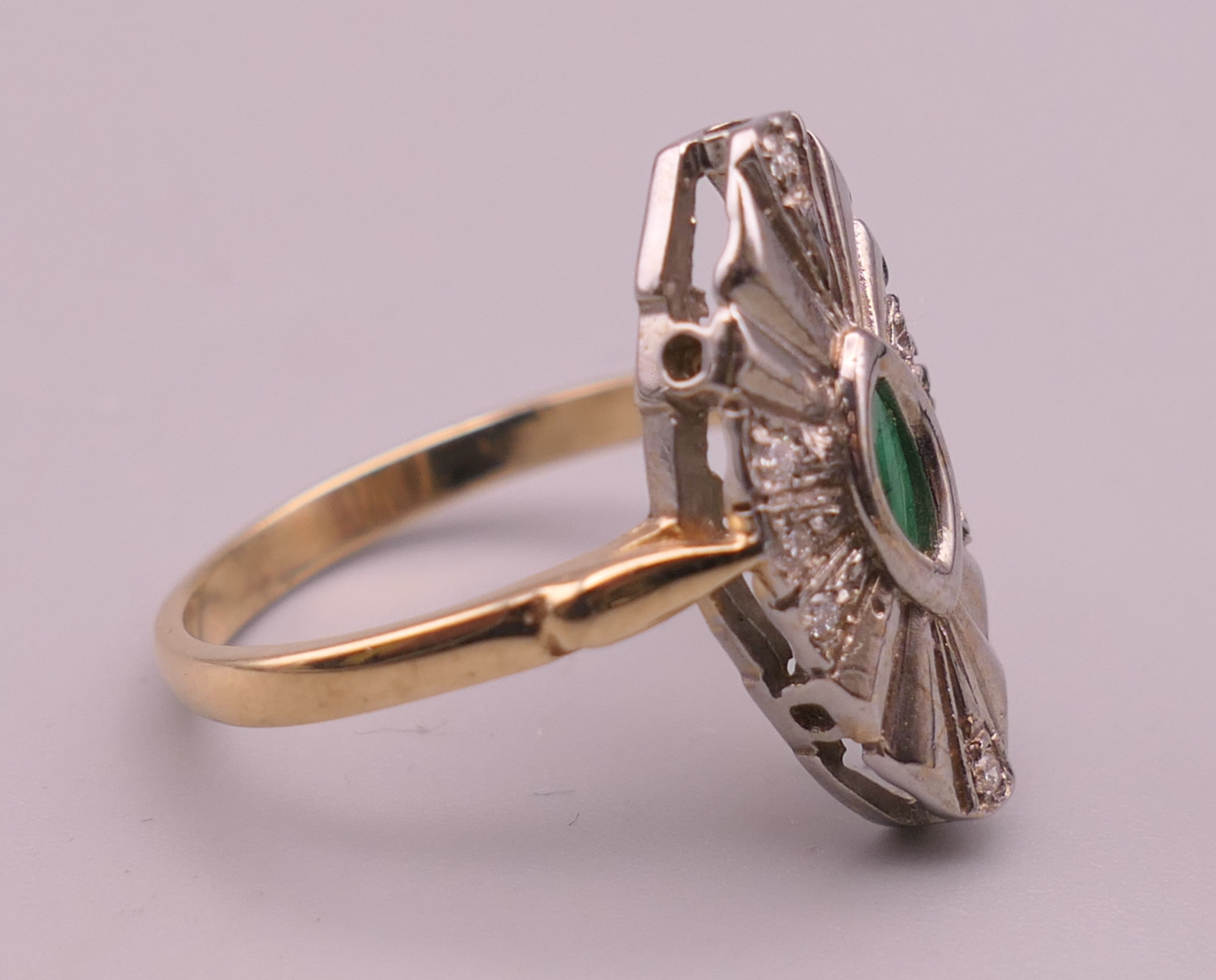 A 9 ct gold, emerald and diamond navette ring. Ring size T/U. 4.2 grammes total weight. - Image 2 of 5