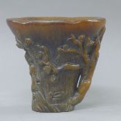 A libation cup. 13.5 cm high.