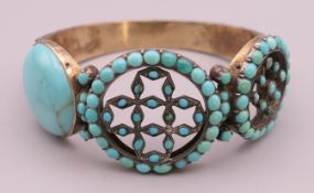 A Victorian silver turquoise bangle. 5.75 cm internal diameter.