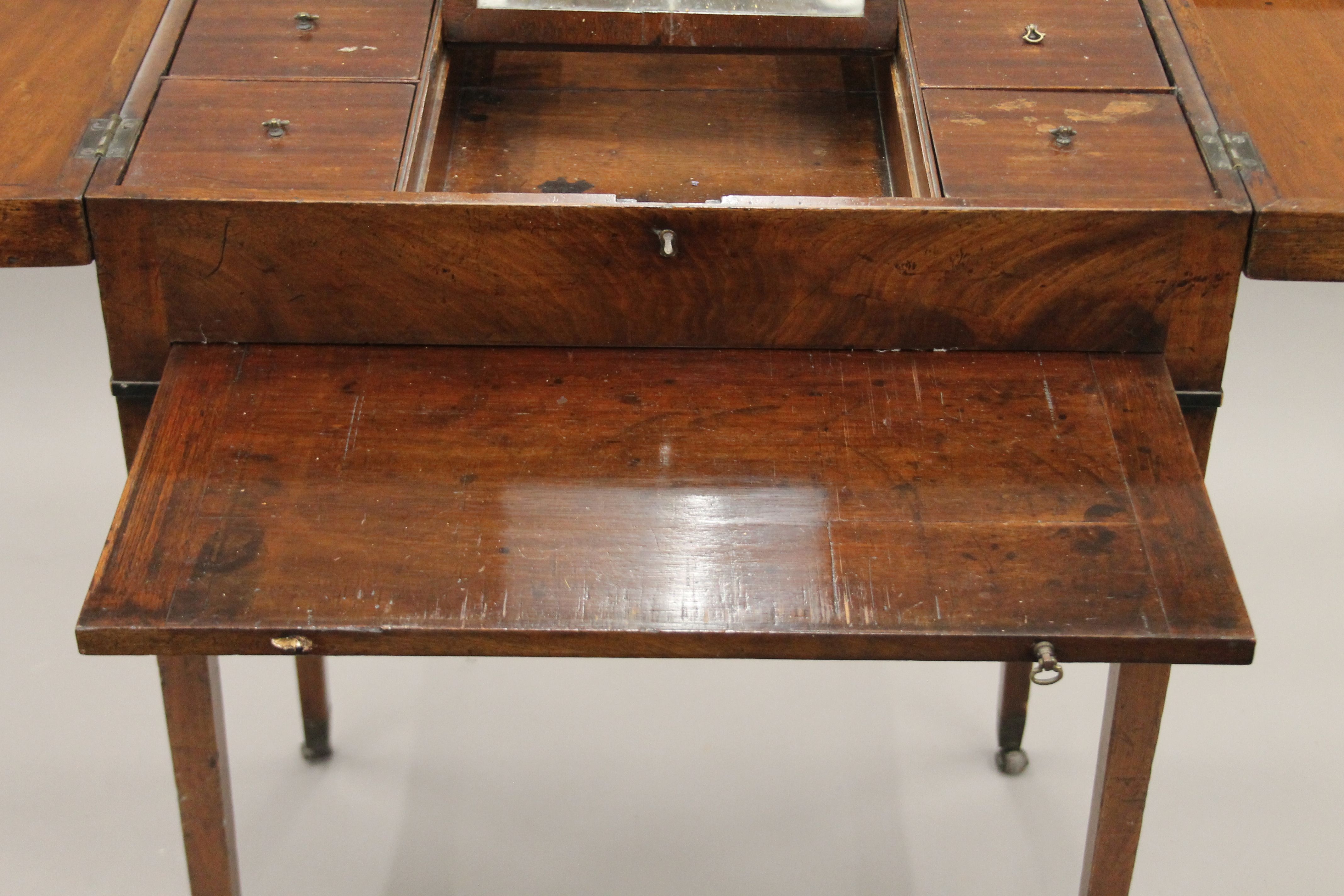 A 19th century mahogany gentleman's fold over dressing table. 63 cm wide. - Image 8 of 8
