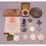 A quantity of medals, medallions and coins, including a 1939-1945 Defence Medal,