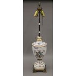 A Chinese armorial type urn shaped porcelain vase and cover, now fitted as a lamp,