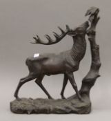 A carved Blackforest model of a stag. 42 cm high.