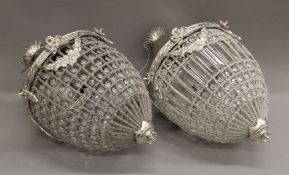 A pair of acorn form chandeliers. Approximately 45 cm high.