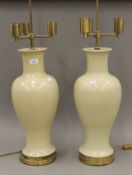 A pair of Chinese porcelain vases, fitted as lamps. Each 90 cm high overall.