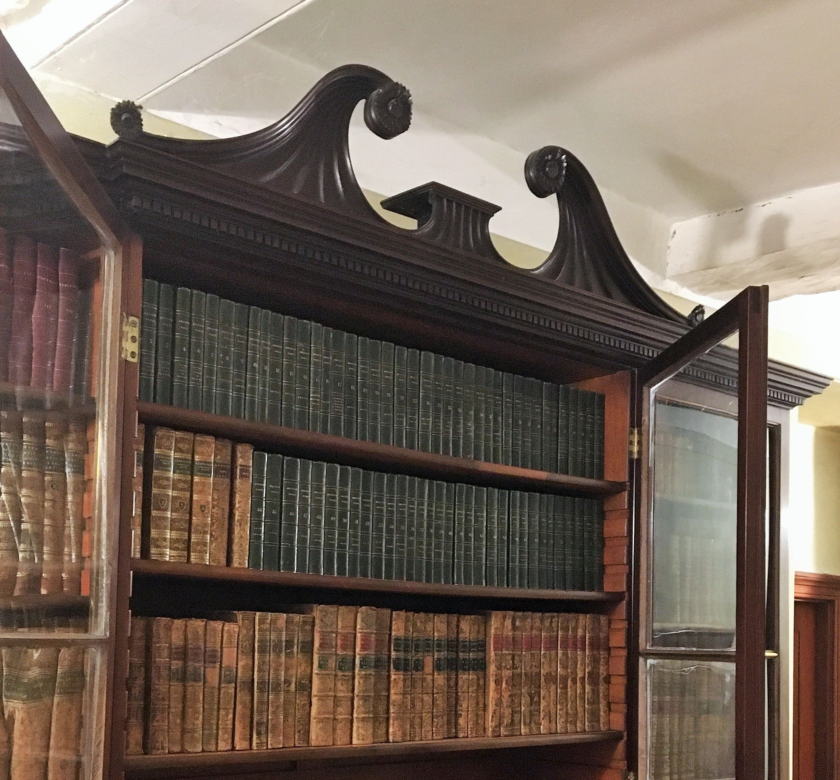 A near pair of early 19th century and later mahogany breakfront bookcases (one probably made to - Image 4 of 18