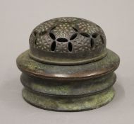 A Chinese bronze lidded censer. 8 cm high.