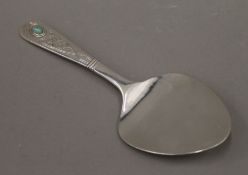 A Liberty and Co silver cake slice. 18.5 cm long. 94.7 grammes total weight.