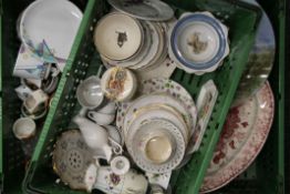 Three boxes of various decorative ceramics.