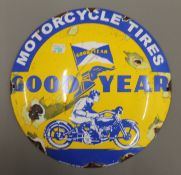 An enamel Goodyear sign. 29 cm diameter.