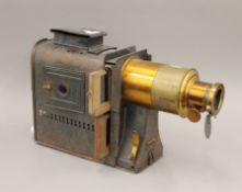 A metamorphic magic lantern projector. 51 cm long.