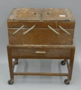 A mid-20th century sewing box. 47 cm wide.