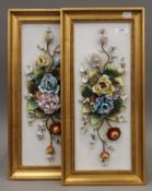 Two porcelain flower plaques, each framed. 49.5 cm high.