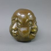 A brass four face Buddha head. 10.5 cm high.