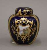 A small Coalport porcelain ginger jar painted with scenic vignettes. 8.5 cm high.