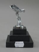 A small model of the spirit of ecstasy. 11.5 cm high.