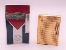 Two Dupont lighters. Largest 6 cm high.