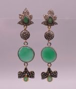 A pair of gold, diamond and chrysoprase stone drop earrings. 6.5 cm long.