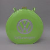 A green VW oil can. 35 cm high.