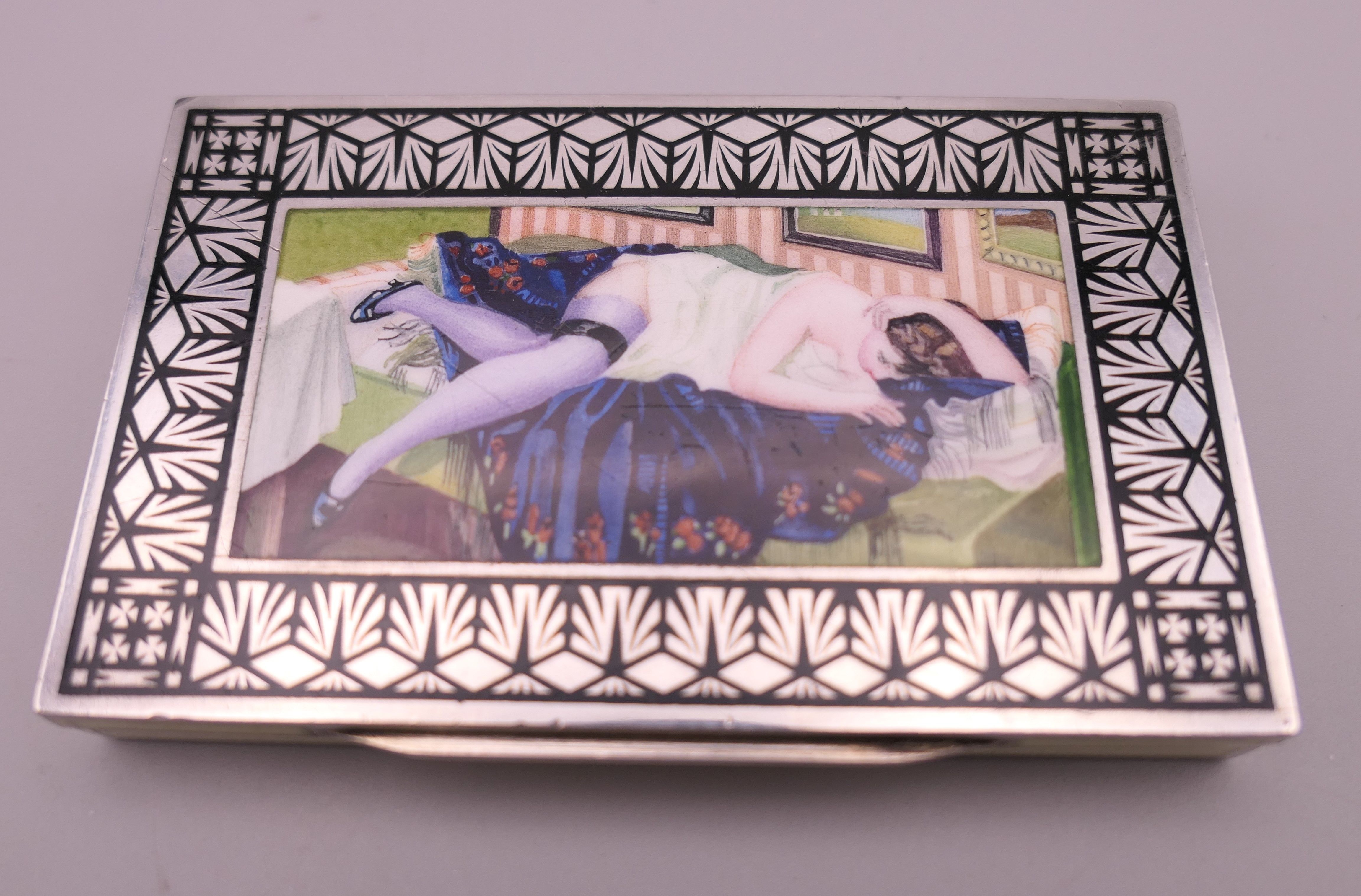 A Continental silver and enamel box, with lid depicting a reclining lady, in a Tadema Gallery box. - Image 2 of 13