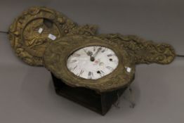 A 19th century Continental brass wall clock.