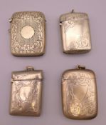 Four silver plated vestas. Largest 5.5 x 4.5 cm.