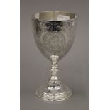 A Victorian embossed silver goblet. 15 cm high. 5.4 troy ounces.
