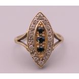 A 9 ct gold navette ring. Ring size O/P. 3.7 grammes total weight.