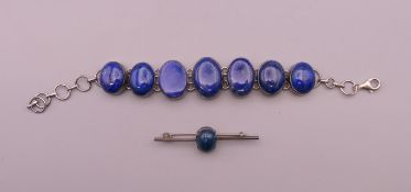 A lapis set bracelet and brooch. Bracelet 21 cm long.