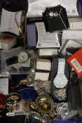 A quantity of costume jewellery and wristwatches.