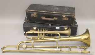 An antique Couesnon Paris silver plated Bb trumpet with quick change to A and English mouthpiece in