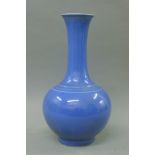 A Chinese porcelain blue ground vase. 39 cm high.